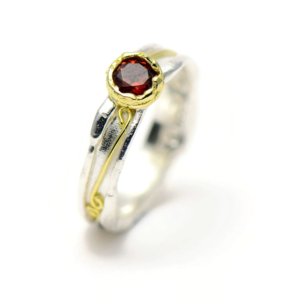 red garnet and gold ring 
