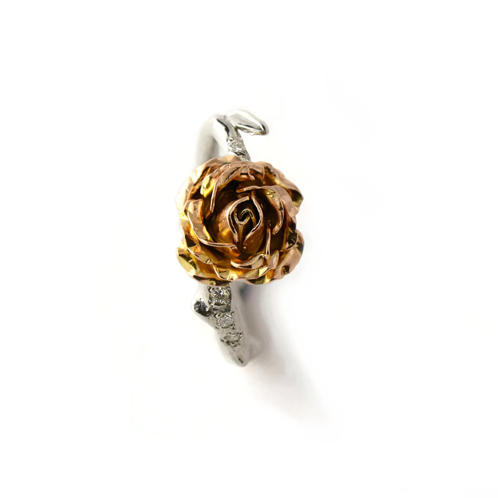 white and rose gold rose ring 