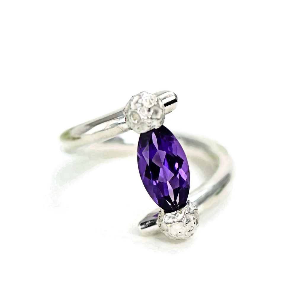 Tension set ring with a marquise amethyst, silver peppercorns ring design 