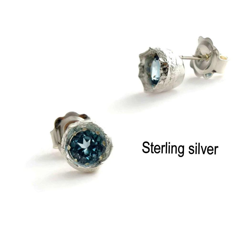 sterling silver and blue topaz stud earrings 