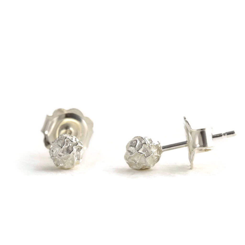 A silver Petite peppercorn stud earrings