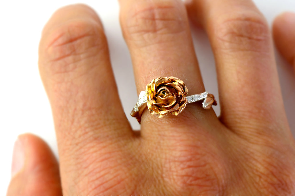 Solitaire rose ring made in 9ct solid rose and white gold, set with 5 tiny diamonds