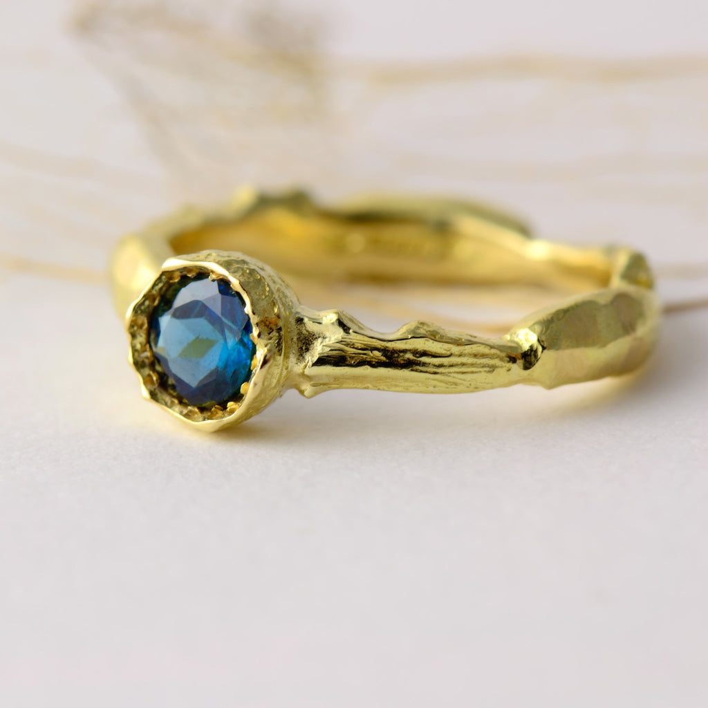 Blue tourmaline and 18 carat gold ring 