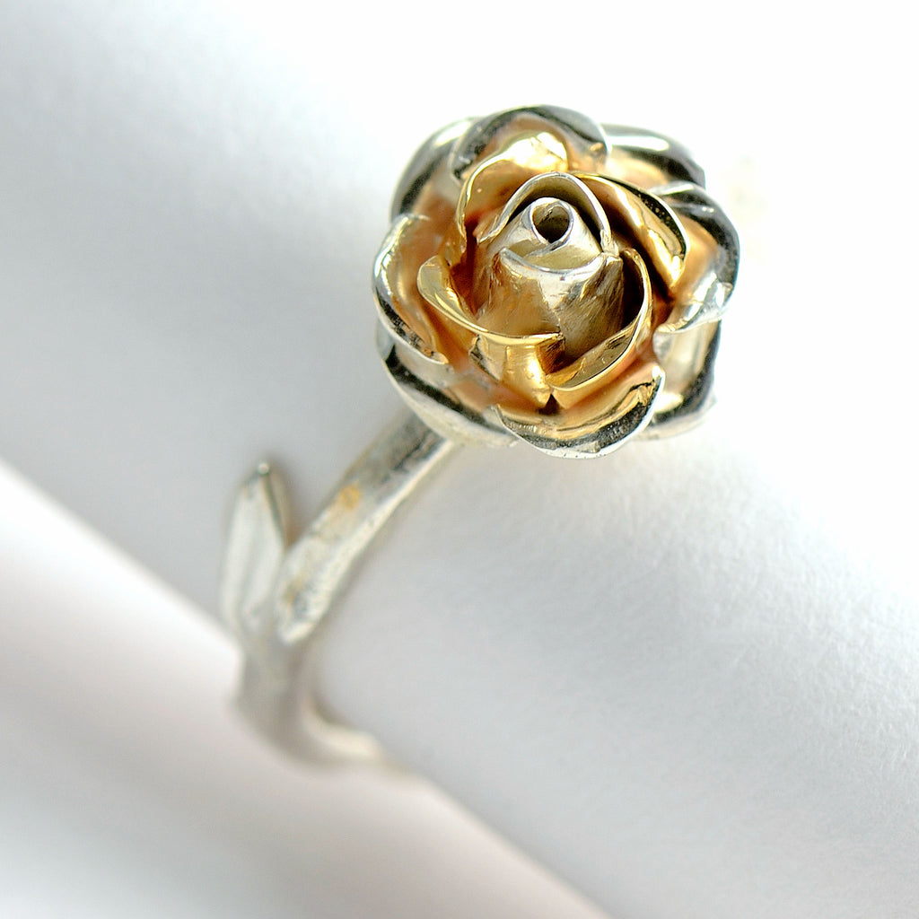 rose gold and silver rose ring