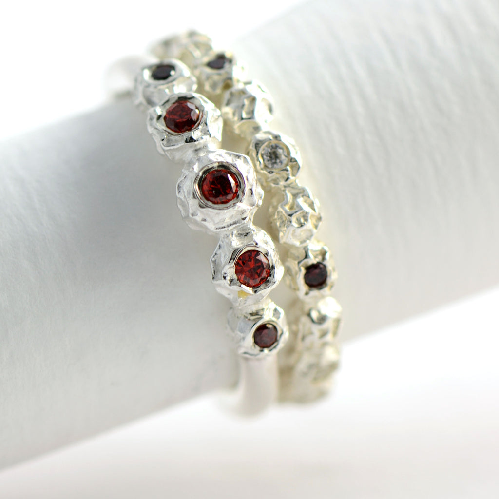 Silver peppercorn eternity rings with garnets and diamonds 