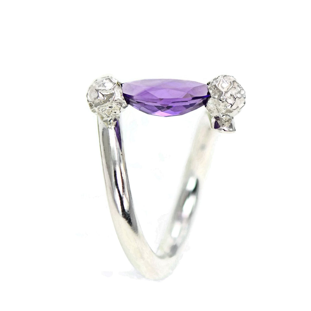 Tension set ring with a marquise Amethyst, silver peppercorns ring design 