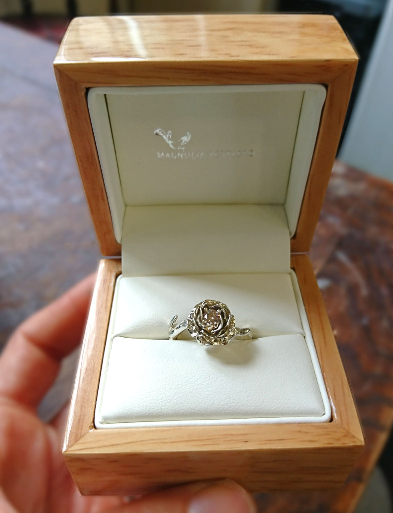 Solitaire rose ring made in 9ct solid rose and white gold, set with 5 tiny diamonds