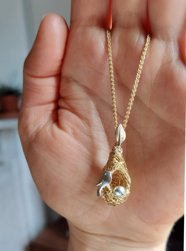 Gold Amazon nest necklace