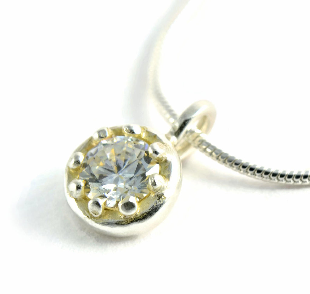 Delicate silver pendant with an elegant crown basket frame and gemstone of your choice