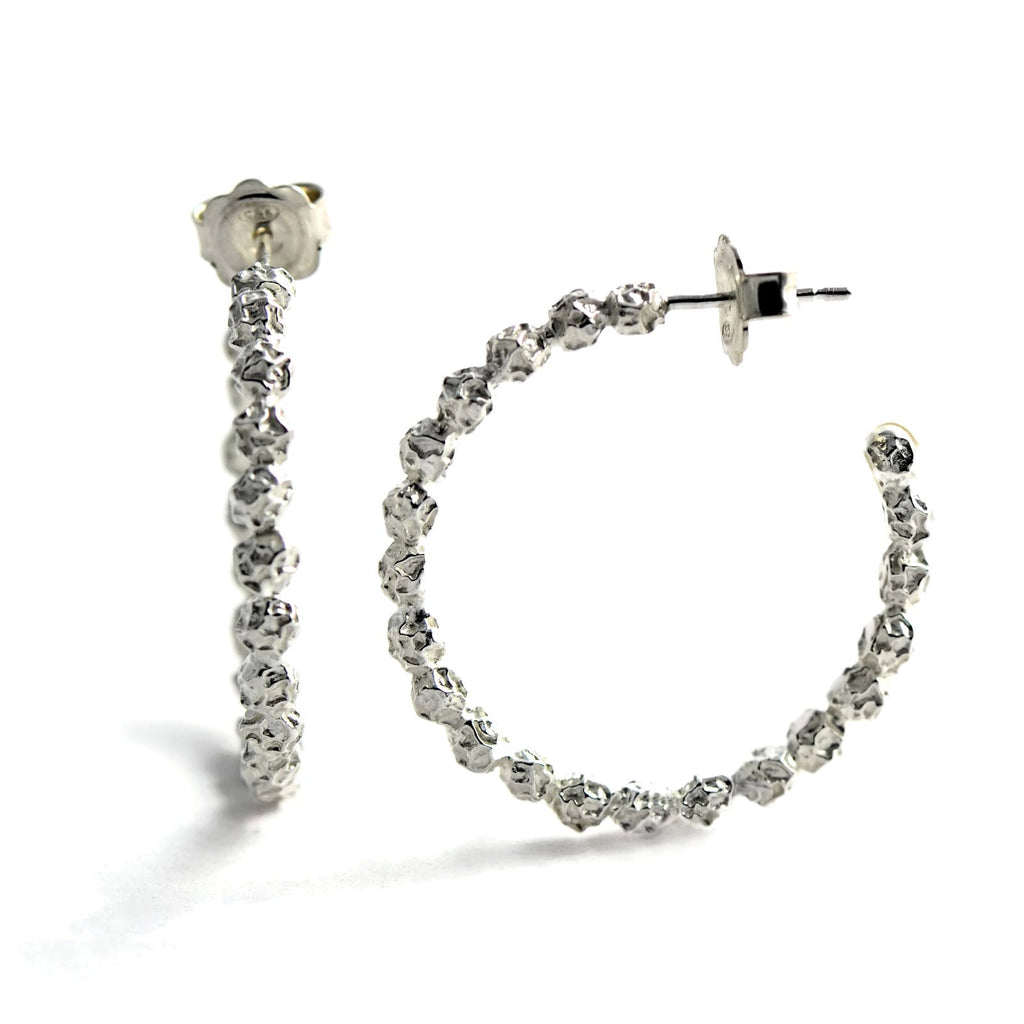 A Large silver peppercorns hoops earrings